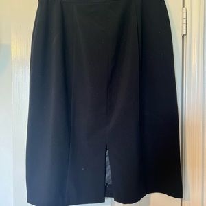 Investments Size 18 black skirt. Slit in front. Fully Lined